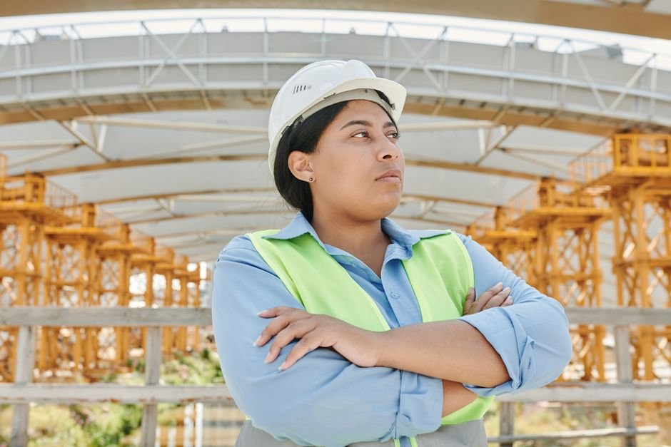 civil engineers inspecting a large highway bridge construction site in Mexico