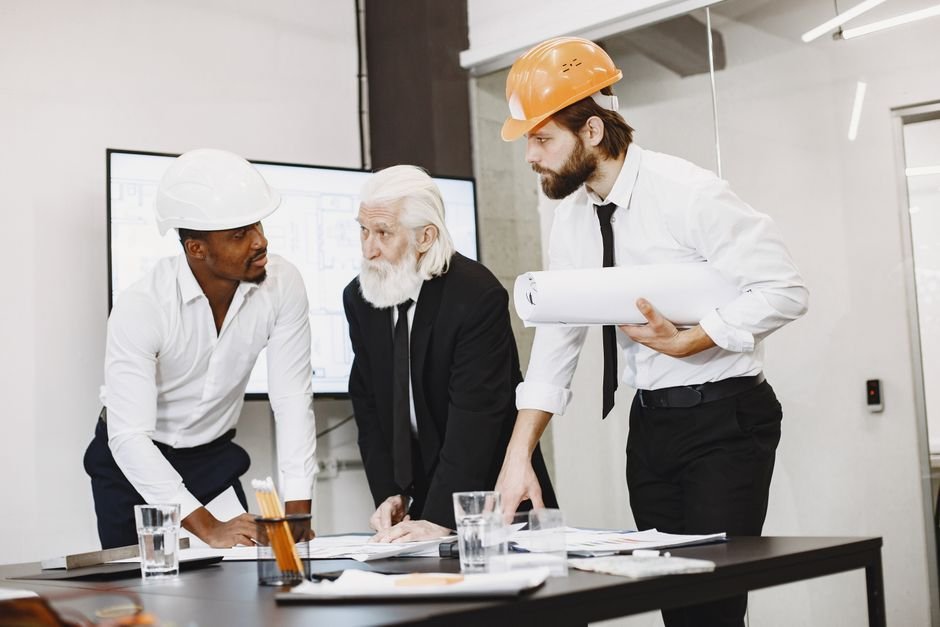 engineers discussing construction plans
