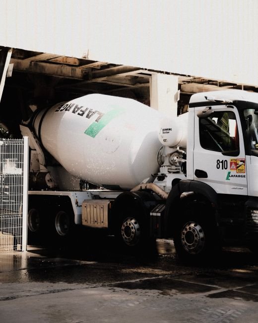 concrete mixer truck operating in a desert construction site