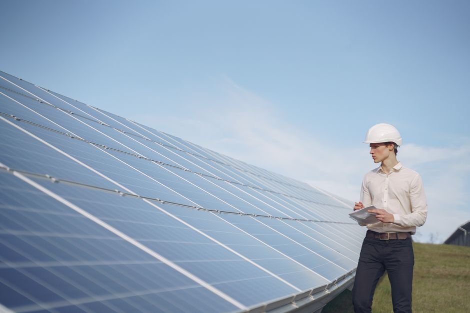 engineers inspecting sustainable industrial construction site in desert