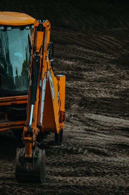 modern excavator machine operating outdoors