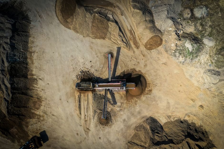 heavy machinery and drilling equipment at open pit gold mine in sonora desert