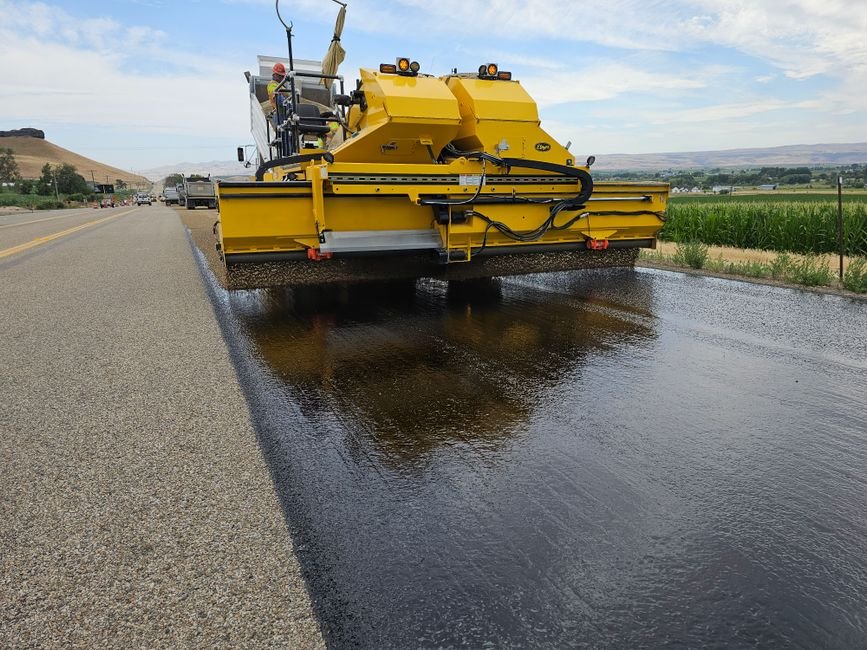 heavy machinery paving a modern highway in Mexico