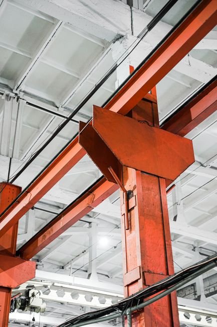 Industrial warehouse interior with logistics infrastructure and steel beams