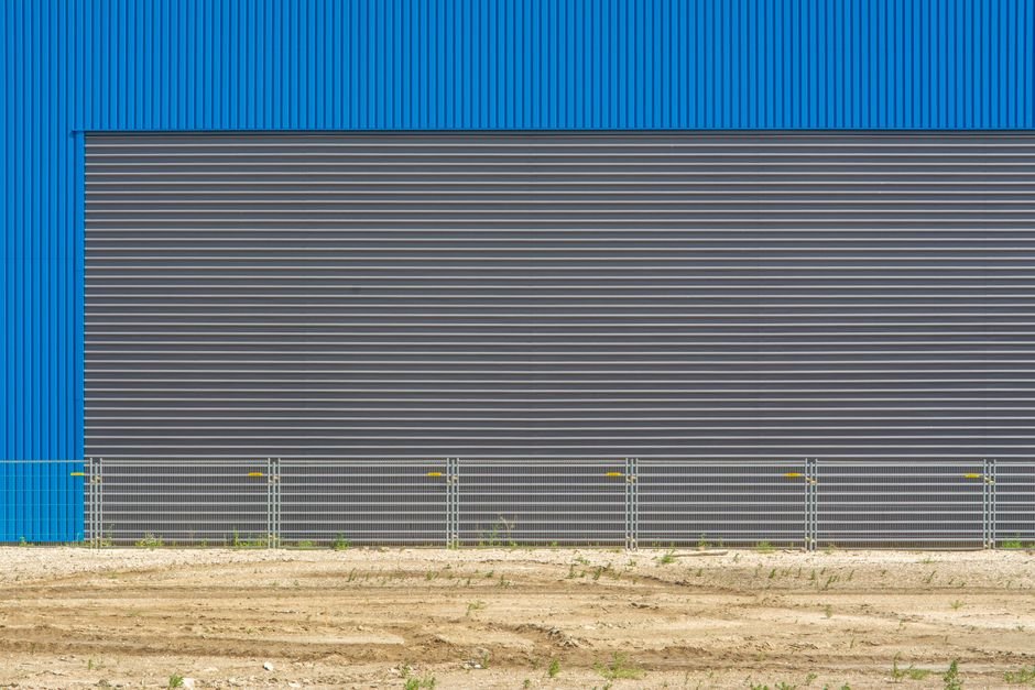 modern industrial warehouse construction site with steel structure