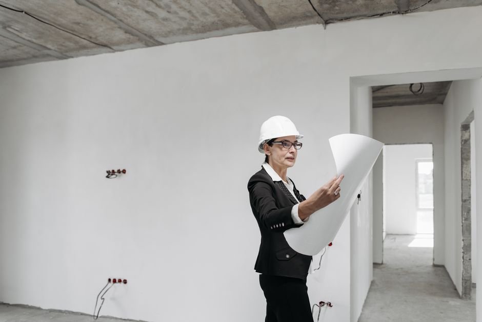 Modern hospital construction site interior with engineers