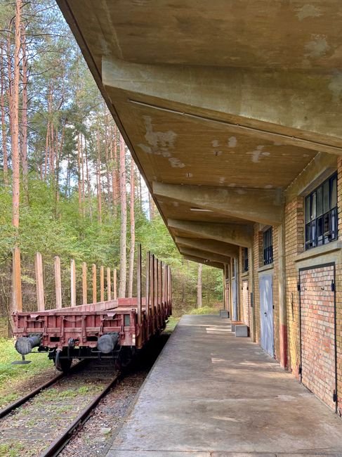 modern industrial warehouse construction site with railway tracks